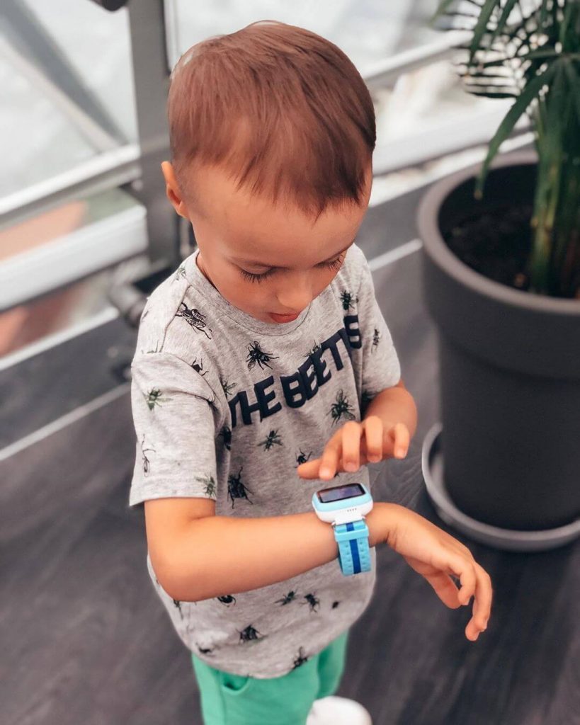boy with a smartwatch